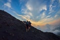 STROMBOLI VOLCANO, ITALY - AUGUST 2015: Group of tourists hiking on top of the Stromboli Volcano in the Aeolian Islands, Sicily, I