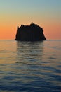 Strombolicchio with lighthouse, sunset at the island, Stromboli volcanoes, calm sea surface, Italy, Europe