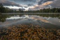 Stromovka park with trees forest and pond Bagr in autumn morning