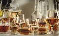 Strong alcohol drinks, hard liquors, spirits and distillates iset in glasses and bottles: cognac, scotch, whiskey and other. Black Royalty Free Stock Photo