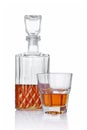 Strong alcoholic drink cognac in old fashion glass and crystal decanter Royalty Free Stock Photo