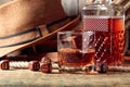 Strong alcoholic drink and dice on a old wooden table Royalty Free Stock Photo