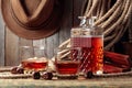 Strong alcoholic drink and dice on a old wooden table Royalty Free Stock Photo