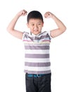 Strong Asian boy showing off his biceps flexing muscles his arm, isolated on white background Royalty Free Stock Photo