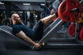 Strong athlete on exercise machine with barbell