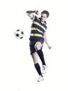 Strong athlete kicking the ball Royalty Free Stock Photo