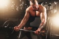 Strong athlete with muscular body lifting barbell Royalty Free Stock Photo