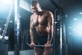 Strong athlete with muscular body lifting barbell Royalty Free Stock Photo