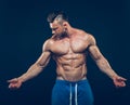 Strong athletic man on black background Royalty Free Stock Photo