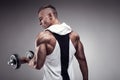 Fitness Model posing back muscles, triceps, latissimus