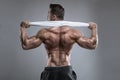 Strong Athletic Man Fitness Model posing back muscles, triceps, Royalty Free Stock Photo