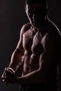 Strong Athletic Man Fitness Model  showing big muscles Royalty Free Stock Photo