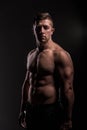 Strong Athletic Man Fitness Model  showing big muscles Royalty Free Stock Photo