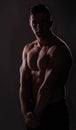 Strong Athletic Man Fitness Model  showing big muscles Royalty Free Stock Photo