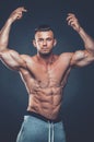 Strong Athletic Man Fitness Model Torso showing six pack abs. is Royalty Free Stock Photo