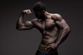 Strong athletic man on black background Royalty Free Stock Photo