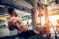 Strong Bodybuilder Doing Heavy Weight Exercise For Back On Machine Royalty Free Stock Photo