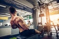 Strong Bodybuilder Doing Heavy Weight Exercise For Back On Machine Royalty Free Stock Photo