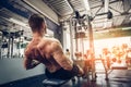 Strong Bodybuilder Doing Heavy Weight Exercise For Back On Machine Royalty Free Stock Photo