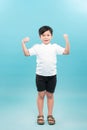 Strong Child. Funny Little Boy.Sport Handsome Boy.bodybuilder showing his hand biceps muscles Royalty Free Stock Photo