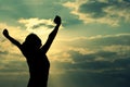 Strong confident woman open arms on beach