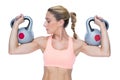 Strong female crossfitter lifting kettlebells Royalty Free Stock Photo