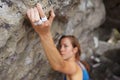 Strong fingers. A rock climber trying to get her grip. Royalty Free Stock Photo