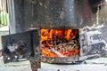 Strong fire in metal sheet cooker Royalty Free Stock Photo