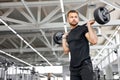 Strong fit muscular man with big muscles doing barbell weight lifting cross training Royalty Free Stock Photo