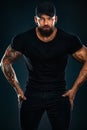 Strong and fit man bodybuilder. Sporty muscular guy athlete. Sport and fitness concept. Men`s fashion. Royalty Free Stock Photo