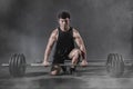 Strong fitness man doing arm workout with barbells in the gym Royalty Free Stock Photo