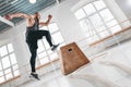 Strong fitness man doing jump exercises on box in gym Royalty Free Stock Photo