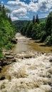 Strong flow and boiling of water in mountain river with splashes. Fast stream in the Carpathians, Ukraine. Stones in a mountain Royalty Free Stock Photo