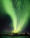 Strong green aurora band coming from the north Royalty Free Stock Photo