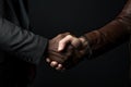 A strong handshake between a European and a black man
