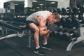 Strong and handsome athletic young man with muscles abs and biceps. Royalty Free Stock Photo