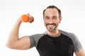 Strong happy mature sportsman make exercises