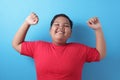 Strong healthy fat Asian boy shows his muscle Royalty Free Stock Photo