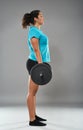 Strong hispanic woman doing deadlift Royalty Free Stock Photo