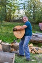 Lumberjack manhandling the beech logs Royalty Free Stock Photo