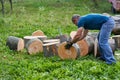 Lumberjack manhandling the beech logs Royalty Free Stock Photo