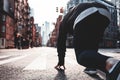 Young runner in strat pose on New York streets Royalty Free Stock Photo