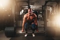 Strong male bodybuilder lifting the weight Royalty Free Stock Photo