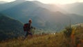 Strong man climb mountains hill nature. Walking tourist enjoy hike on vacation.