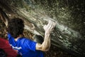 Strong man forearm bouldering