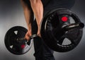 Strong man deadlifts a lot of weight Royalty Free Stock Photo