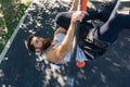 Strong man doing hanging leg raises for abdominal muscles Royalty Free Stock Photo