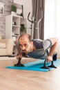 Strong man doing push ups on yoga mat Royalty Free Stock Photo