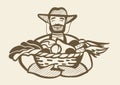 A strong man holds a basket with a harvest of vegetables. Farmer in a hat, the logo is black and white. Royalty Free Stock Photo