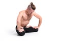 Strong man practicing yoga doing breathing exercises against white background Royalty Free Stock Photo